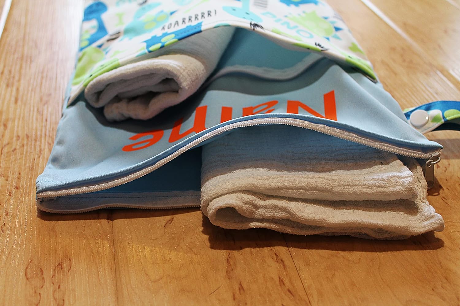 Personalised Wet Bag with Name in Germany with 2 Separate Compartments, as a Nappy Bag, in Nursery or on the Go (Pack of 2 Dinos) – Bild 5